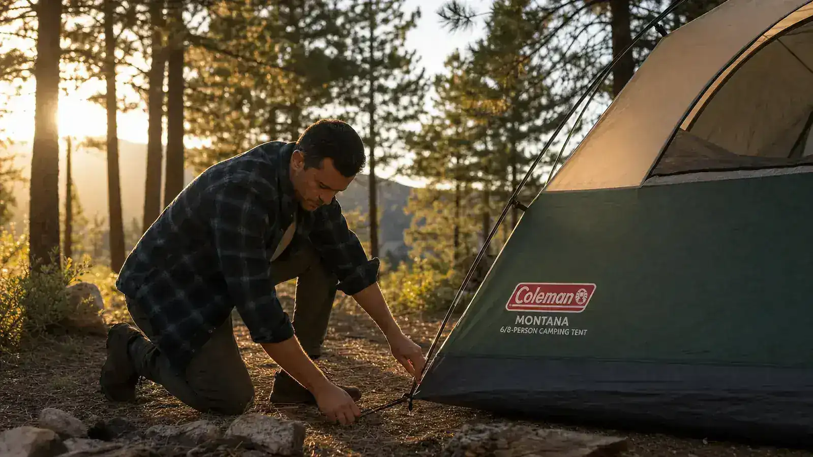 Hand unzipping the Coleman Montana tent's large front door panel, showing the spacious interior with sleeping bags laid out